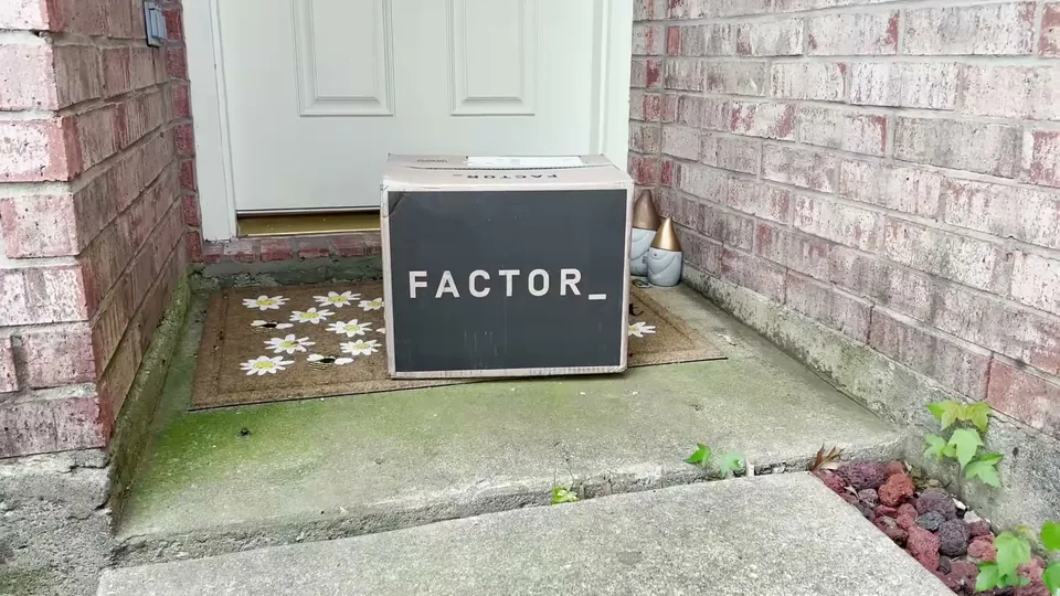 A Factor box on the doorstep in Dylan's "I Tried Weird Themed Restaurants", May 2024, one of the few Factor reads on a food channel